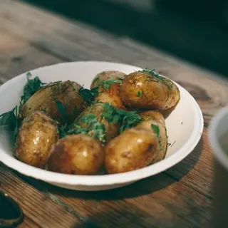 Baby potatoes in beef fat