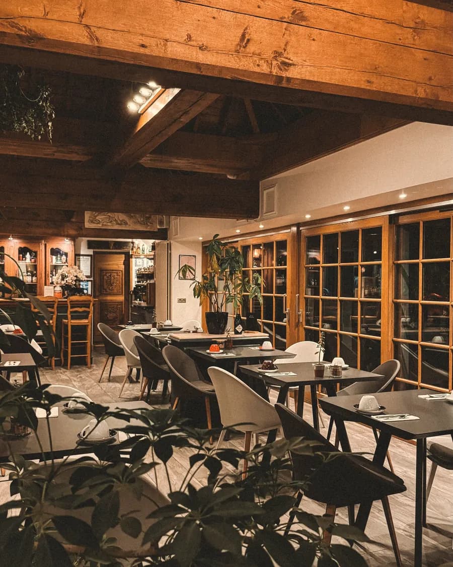 Wooden beams and tables in the front room